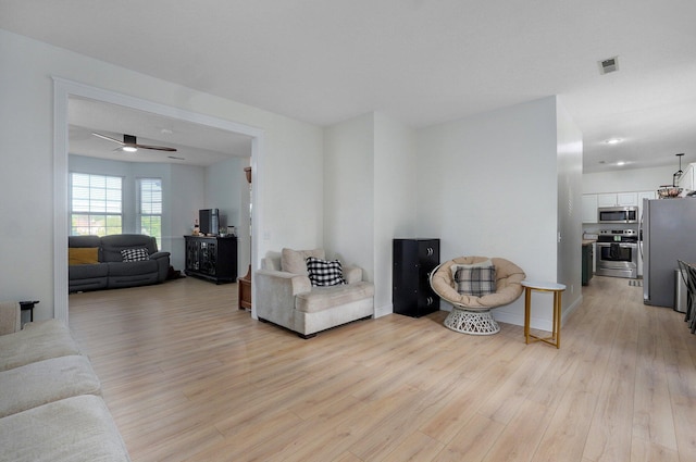 505 Thunderbird Dr, Rogersville, MO 65742 - living room featuring light wood-style flooring and a ceiling fan