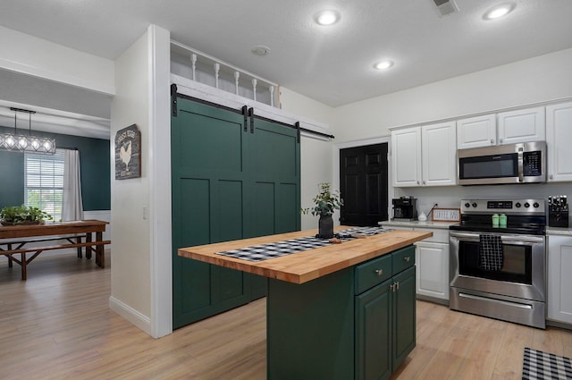 505 Thunderbird Dr, Rogersville, MO 65742 - kitchen featuring appliances with stainless steel finishes, wood counters, green cabinets, white cabinetry, and light wood finished floors