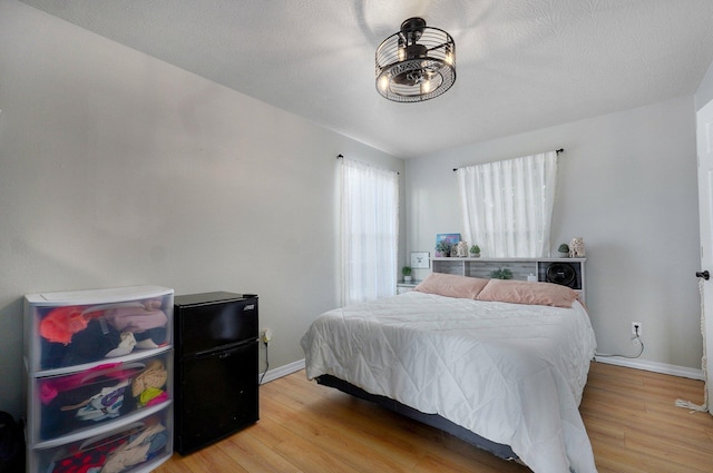505 Thunderbird Dr, Rogersville, MO 65742 - bedroom with wood finished floors and baseboards