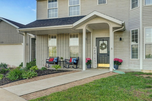 505 Thunderbird Dr, Rogersville, MO 65742 - property entrance featuring a porch, a garage, and a shingled roof