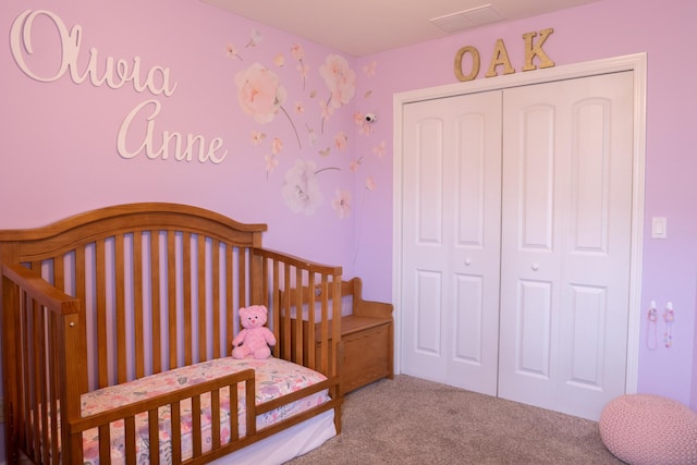 711 Morning Glory Dr, Nixa, MO 65714 - bedroom featuring carpet, a closet, and a nursery area