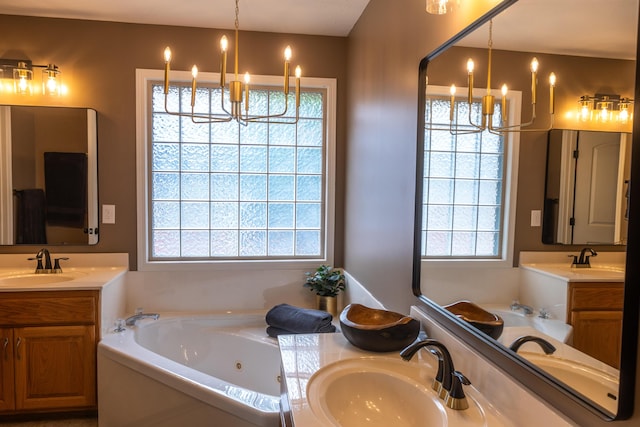711 Morning Glory Dr, Nixa, MO 65714 - full bath with a chandelier, two vanities, and a tub with jets