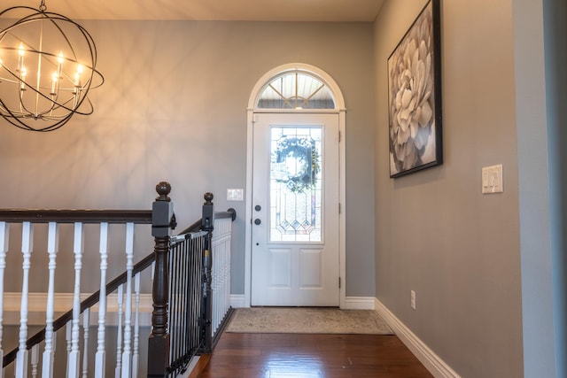 711 Morning Glory Dr, Nixa, MO 65714 - foyer featuring a chandelier, hardwood / wood-style flooring, and baseboards