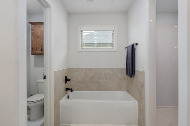 1002 E Tipperary Ct, Nixa, MO 65714 - bathroom with toilet and a bath