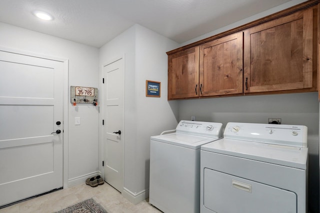 1002 E Tipperary Ct, Nixa, MO 65714 - laundry area featuring washing machine and dryer, cabinet space, baseboards, and recessed lighting