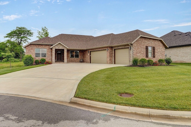 1002 E Tipperary Ct, Nixa, MO 65714 - view of front of property featuring an attached garage, brick siding, a front yard, and concrete driveway
