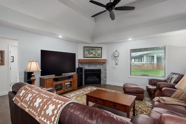 1002 E Tipperary Ct, Nixa, MO 65714 - living area with wood finished floors, ceiling fan, vaulted ceiling, baseboards, and a fireplace