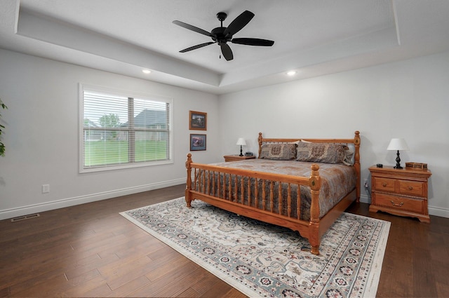 1002 E Tipperary Ct, Nixa, MO 65714 - bedroom with a raised ceiling, baseboards, wood finished floors, and recessed lighting