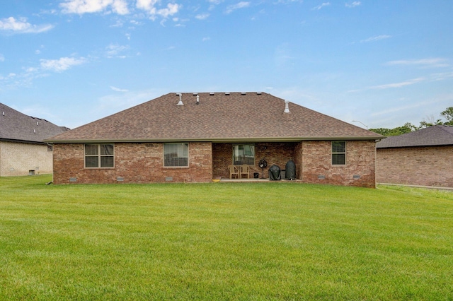 1002 E Tipperary Ct, Nixa, MO 65714 - back of house featuring a lawn, a shingled roof, and brick siding