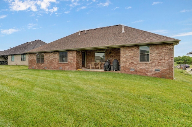 1002 E Tipperary Ct, Nixa, MO 65714 - back of house with crawl space, roof with shingles, a lawn, and brick siding