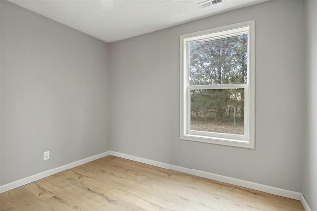 2845 US Highway 65, Urbana, MO 65767 - unfurnished room with baseboards and wood finished floors