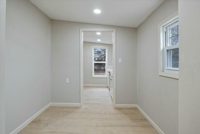 2845 US Highway 65, Urbana, MO 65767 - hallway featuring light wood-type flooring, healthy amount of natural light, baseboards, and recessed lighting