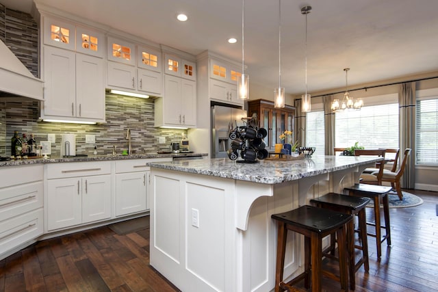 992 N Cedar Ridge Ave, Springfield, MO 65802 - kitchen featuring stainless steel fridge, a sink, dark wood-style floors, backsplash, and recessed lighting