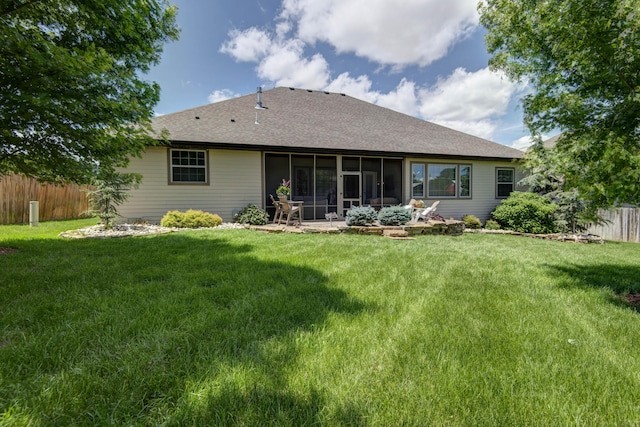 992 N Cedar Ridge Ave, Springfield, MO 65802 - rear view of property with a sunroom and a shingled roof