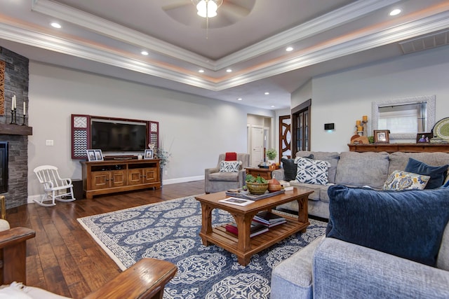 992 N Cedar Ridge Ave, Springfield, MO 65802 - living area featuring crown molding, a raised ceiling, ceiling fan, hardwood / wood-style flooring, and a stone fireplace