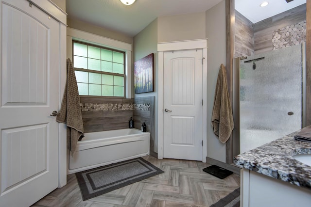 992 N Cedar Ridge Ave, Springfield, MO 65802 - full bathroom with a bath, a walk in shower, vanity, a skylight, and recessed lighting