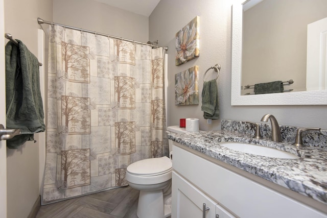 992 N Cedar Ridge Ave, Springfield, MO 65802 - bathroom with vanity, toilet, and curtained shower