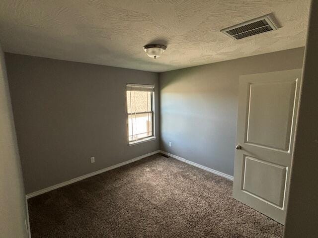 1015 E Lakota St, Nixa, MO 65714 - spare room featuring carpet flooring, baseboards, and a textured ceiling
