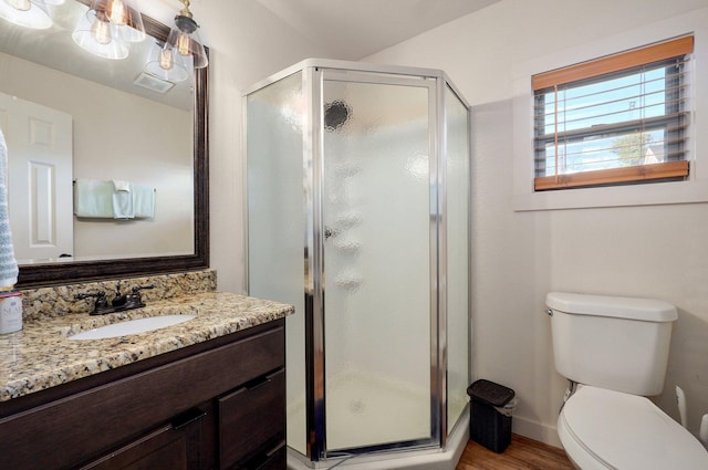 4656 W State Highway H Unit 3, Lampe, MO 65681 - full bathroom featuring wood finished floors, a shower stall, vanity, toilet, and baseboards