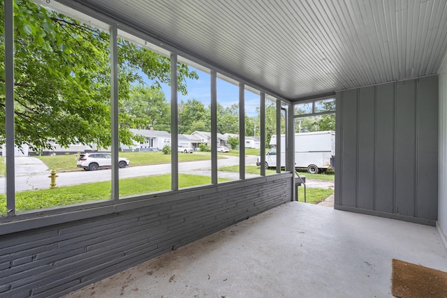 1116 W University St, Springfield, MO 65807 - unfurnished sunroom with a residential view