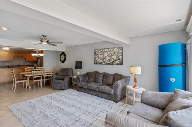 783 Winn Rd Unit 5B, Osage Beach, MO 65065 - living room with light tile patterned floors, ceiling fan, and a chandelier