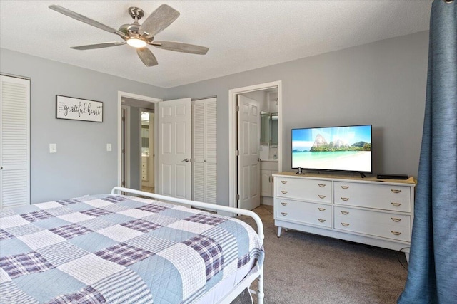 783 Winn Rd Unit 5B, Osage Beach, MO 65065 - bedroom with dark colored carpet, connected bathroom, and ceiling fan