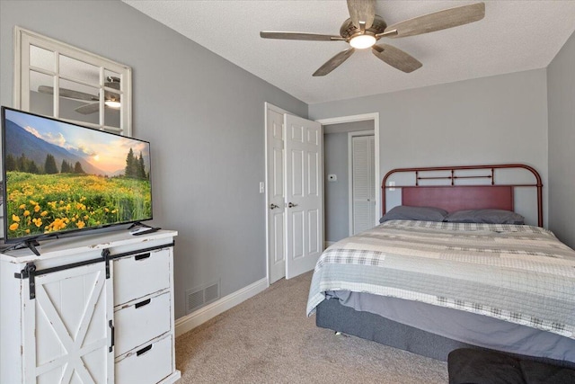783 Winn Rd Unit 5B, Osage Beach, MO 65065 - bedroom featuring light colored carpet, baseboards, and ceiling fan