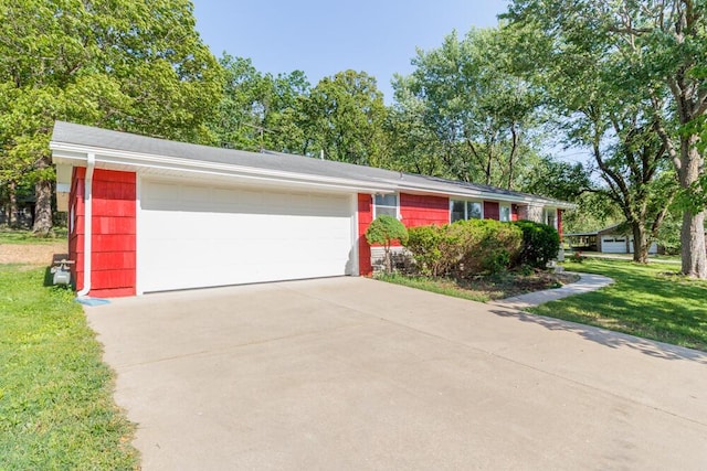 1318 S Farm Rd Unit 205, Springfield, MO 65809 - ranch-style home with a front yard and an attached garage