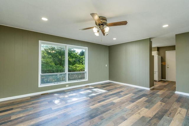 1318 S Farm Rd Unit 205, Springfield, MO 65809 - spare room with ceiling fan, wood finished floors, baseboards, and recessed lighting