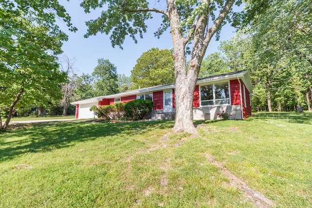 1318 S Farm Rd Unit 205, Springfield, MO 65809 - ranch-style home featuring an attached garage and a front yard