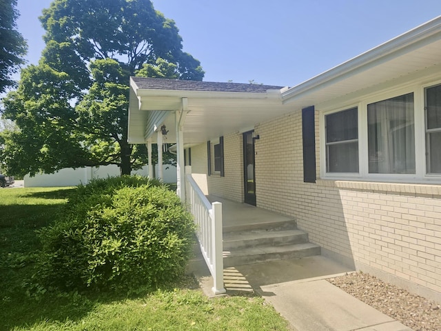 407 N Crestview Ave, Ash Grove, MO 65604 - doorway to property featuring brick siding