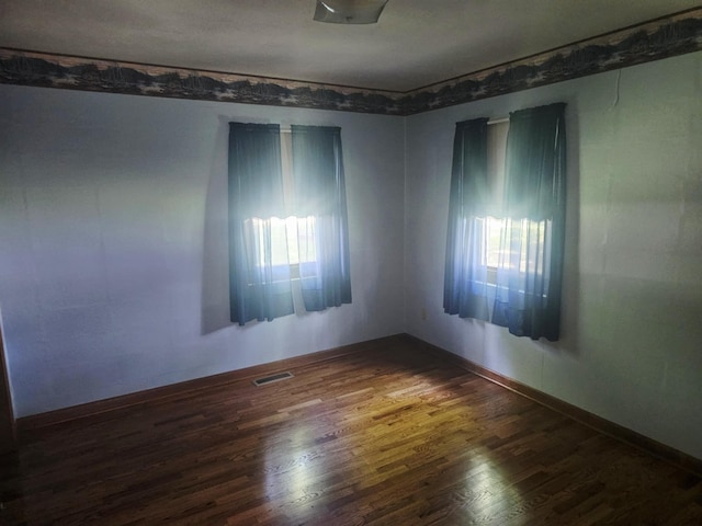 407 N Crestview Ave, Ash Grove, MO 65604 - spare room with dark wood finished floors