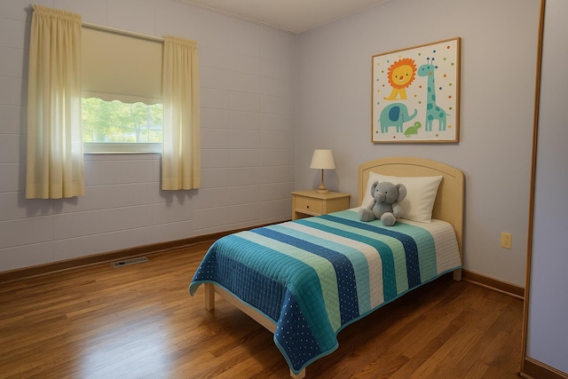 407 N Crestview Ave, Ash Grove, MO 65604 - bedroom with wood finished floors and baseboards