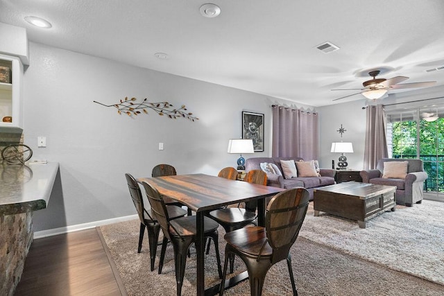 175 W Rockford Dr Unit 6, Branson, MO 65616 - dining area featuring wood finished floors, ceiling fan, and baseboards