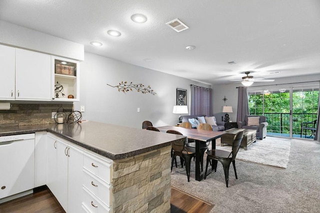 175 W Rockford Dr Unit 6, Branson, MO 65616 - kitchen with a peninsula, open floor plan, white dishwasher, dark countertops, and a ceiling fan