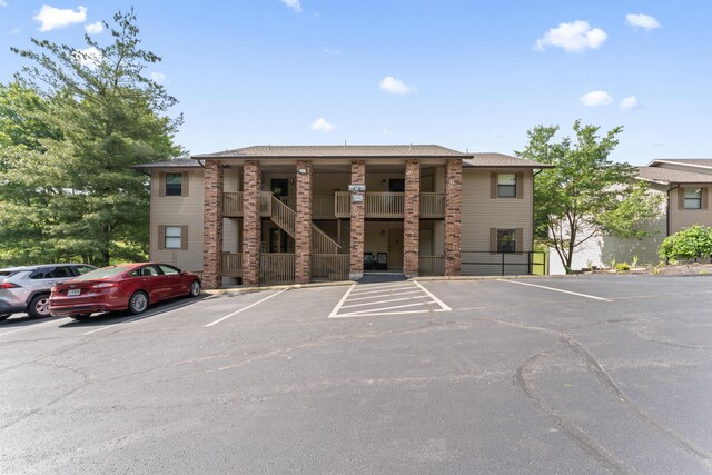 264 Turnberry Dr Unit 2, Branson, MO 65615 - view of building exterior with uncovered parking