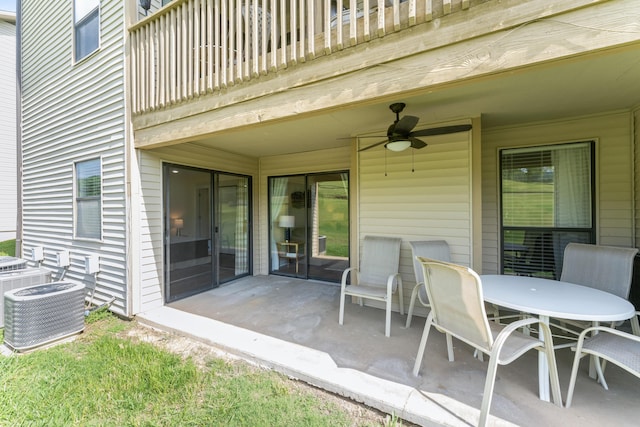 264 Turnberry Dr Unit 2, Branson, MO 65615 - view of patio / terrace featuring ceiling fan, a balcony, cooling unit, and outdoor dining space