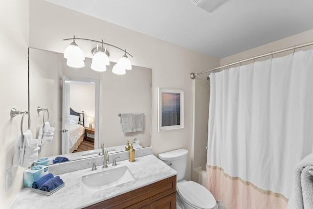 264 Turnberry Dr Unit 2, Branson, MO 65615 - ensuite bathroom featuring toilet, vanity, and shower / bath combo