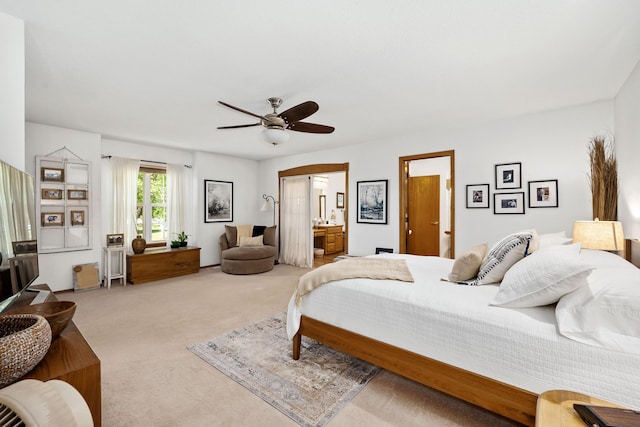 1362 Meadowview Ln, Diamond, MO 64840 - bedroom with light colored carpet, ensuite bath, and a ceiling fan