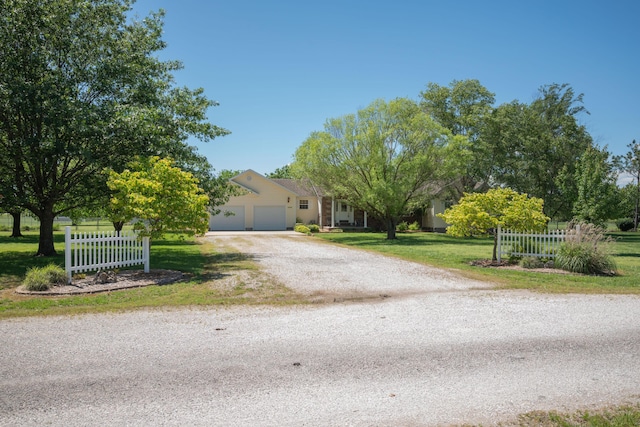 1362 Meadowview Ln, Diamond, MO 64840 - view of front of house featuring driveway and a garage