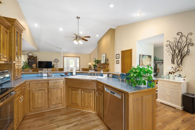 1362 Meadowview Ln, Diamond, MO 64840 - kitchen with appliances with stainless steel finishes, a sink, open floor plan, light wood-style flooring, and vaulted ceiling