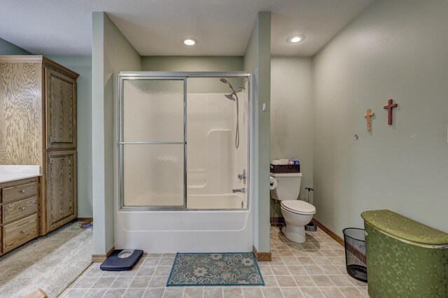 707 Lexie Ln, Carthage, MO 64836 - bathroom with toilet, baseboards, enclosed tub / shower combo, tile patterned floors, and vanity