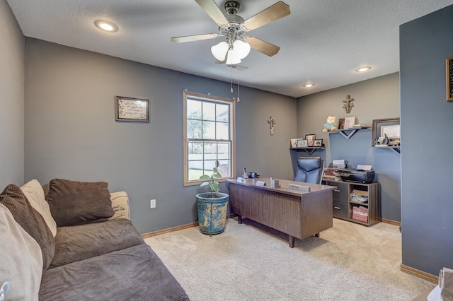 707 Lexie Ln, Carthage, MO 64836 - home office with light carpet, a ceiling fan, baseboards, and a textured ceiling