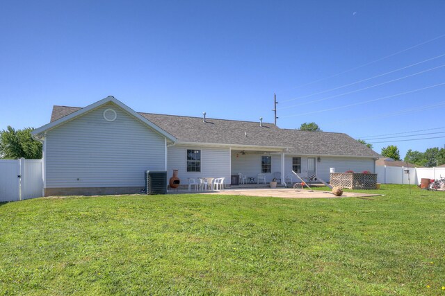 707 Lexie Ln, Carthage, MO 64836 - rear view of house featuring central AC unit, a patio area, and roof with shingles