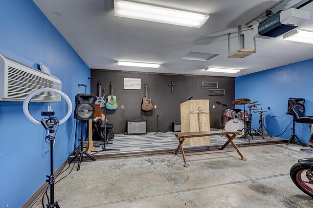 707 Lexie Ln, Carthage, MO 64836 - garage featuring a garage door opener