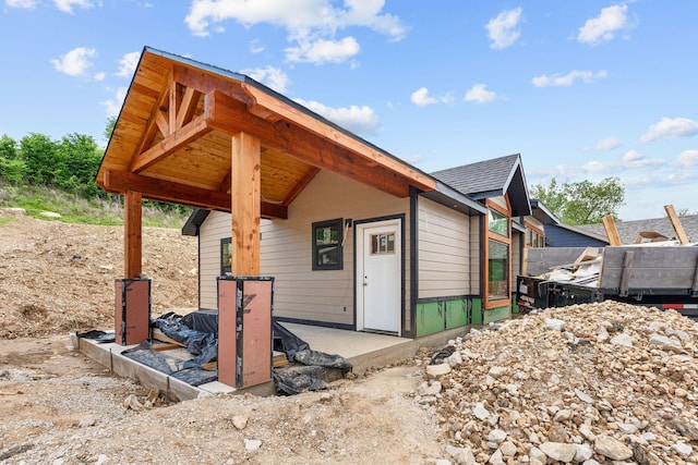 403 Lookout Flts, Branson, MO 65616 - exterior space with roof with shingles
