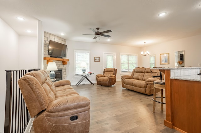 4738 N Florence Ave, Ozark, MO 65721 - living area with light wood-type flooring, a ceiling fan, a chandelier, healthy amount of natural light, and recessed lighting