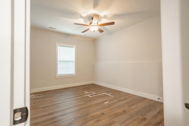 4738 N Florence Ave, Ozark, MO 65721 - empty room featuring a ceiling fan, wood finished floors, and baseboards