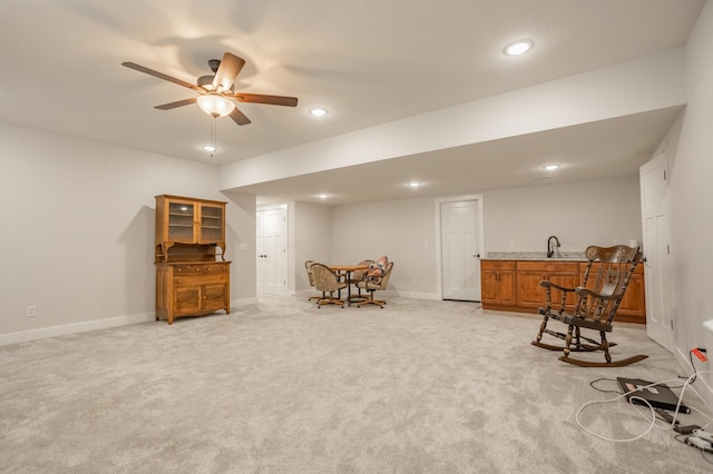 4738 N Florence Ave, Ozark, MO 65721 - sitting room featuring wet bar, recessed lighting, light carpet, baseboards, and ceiling fan