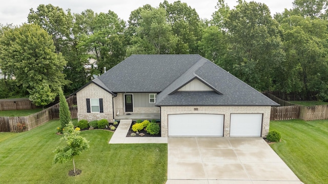 4738 N Florence Ave, Ozark, MO 65721 - view of front of home with a shingled roof, a garage, driveway, and brick siding